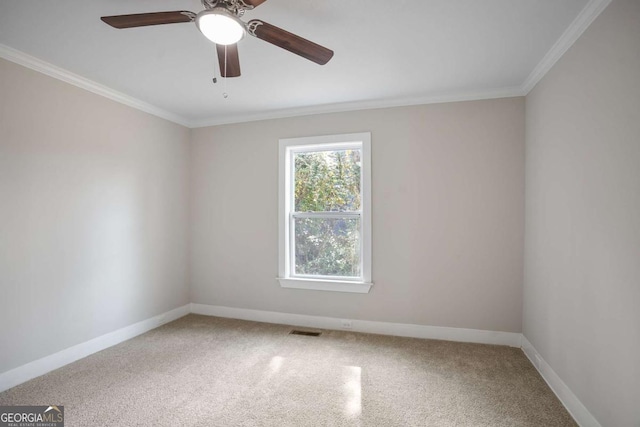 unfurnished room with crown molding and ceiling fan