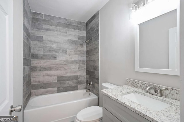 full bathroom featuring vanity, shower / tub combination, and toilet