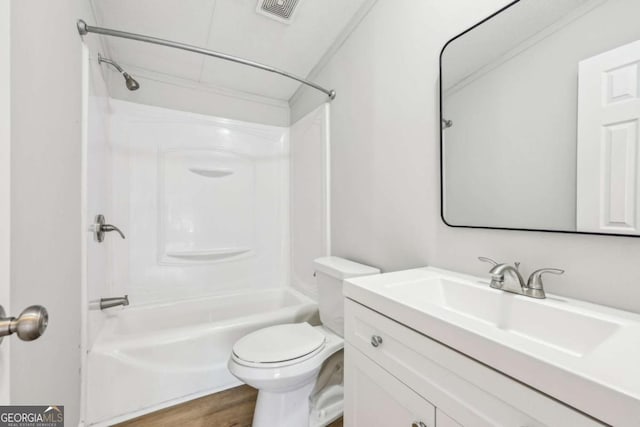 full bathroom with vanity, wood-type flooring, tub / shower combination, and toilet