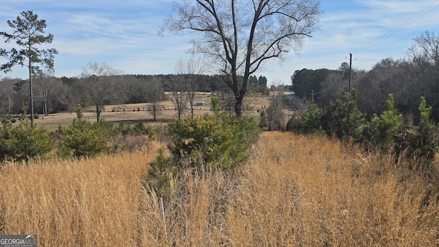 exterior space featuring a rural view