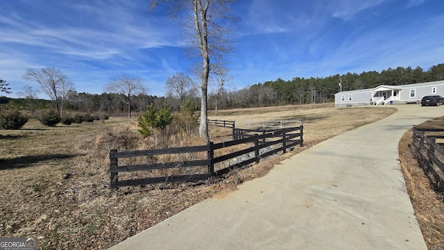 exterior space with a rural view