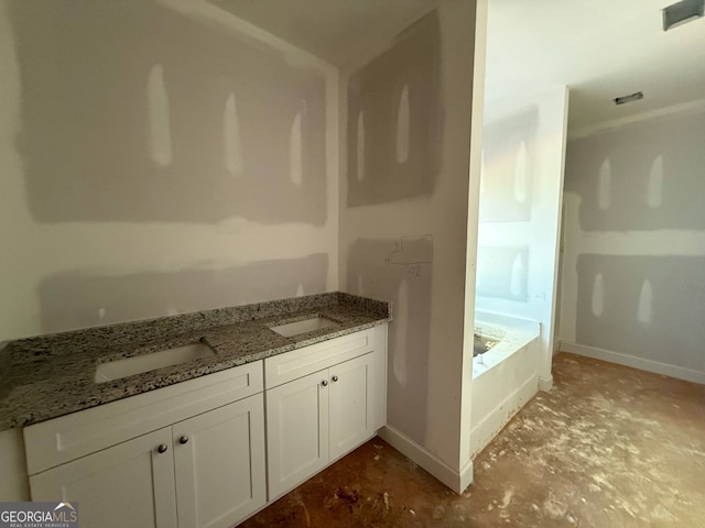 150 Asa Moseley Rd, Mcdonough, GA 30252 - full bath with a garden tub and baseboards
