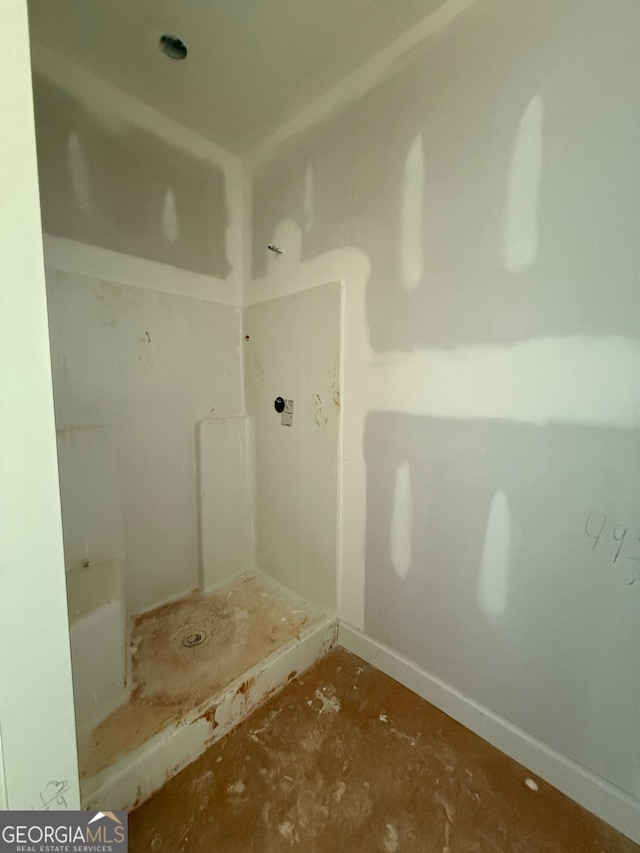 150 Asa Moseley Rd, Mcdonough, GA 30252 - bathroom featuring baseboards and a shower