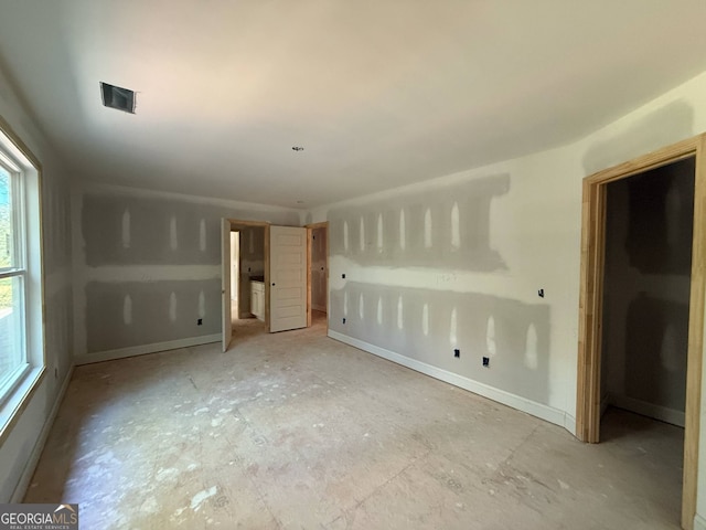 150 Asa Moseley Rd, Mcdonough, GA 30252 - unfurnished bedroom featuring baseboards