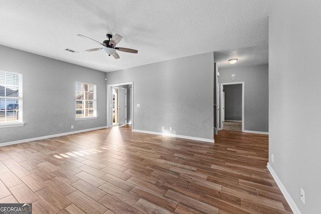 empty room with ceiling fan