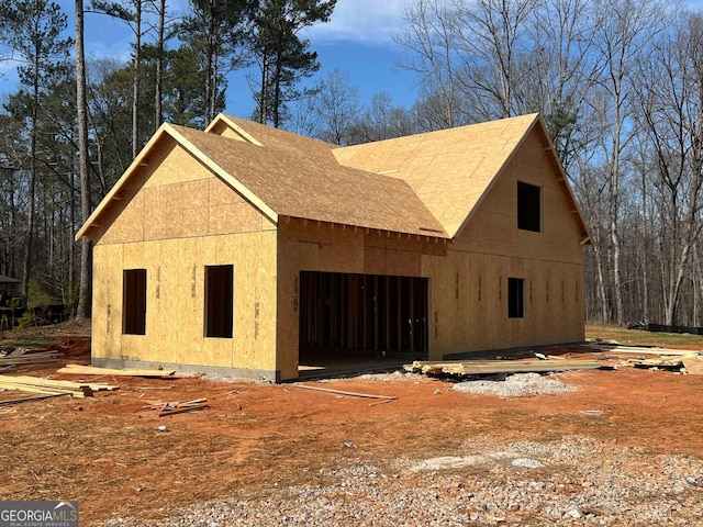 view of home's exterior featuring a garage and stucco siding