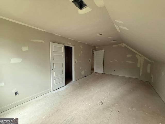 bonus room featuring lofted ceiling