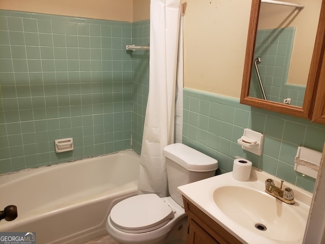 full bathroom featuring tile walls, vanity, toilet, and shower / bathtub combination with curtain