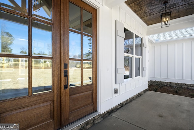 property entrance with board and batten siding