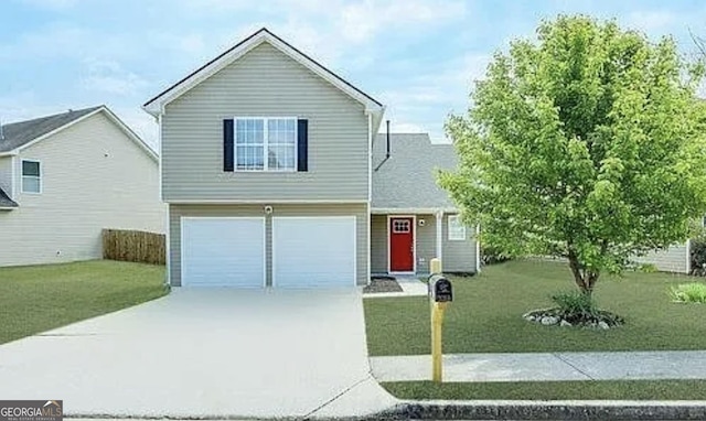 view of front of home featuring a garage and a front lawn