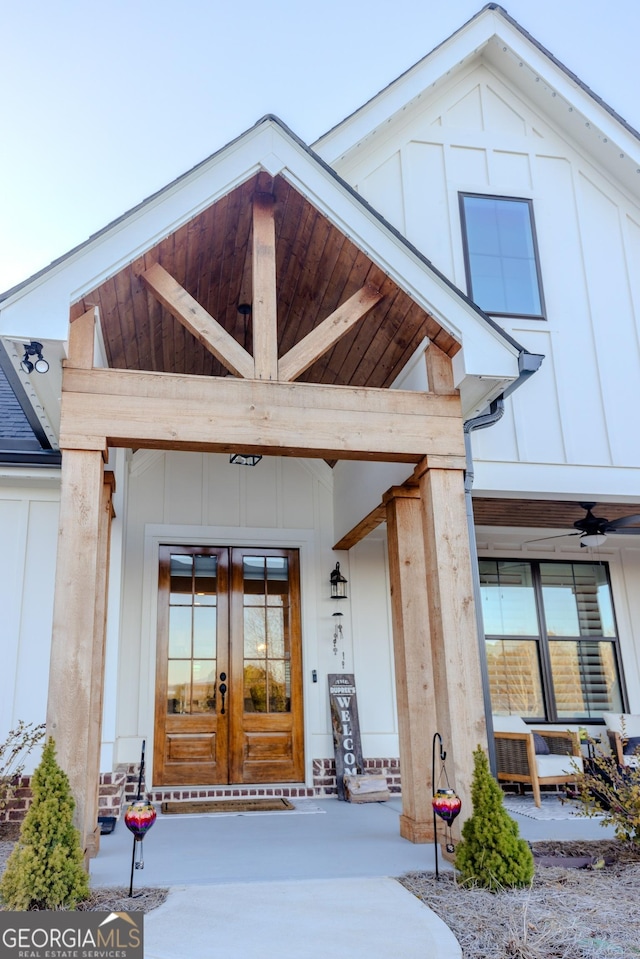 property entrance featuring french doors