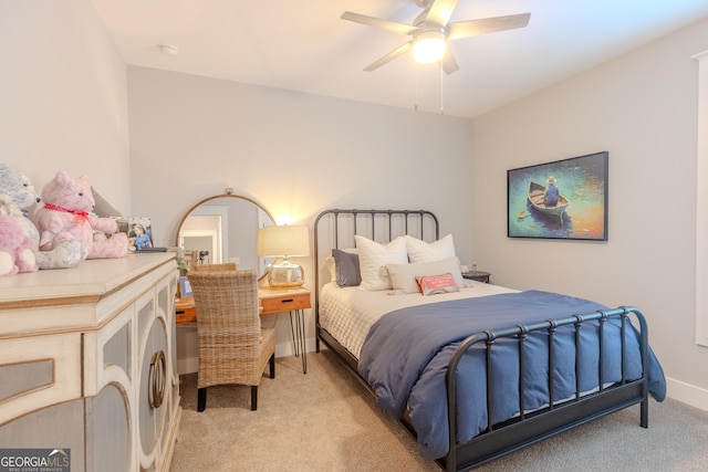 bedroom featuring ceiling fan and light colored carpet