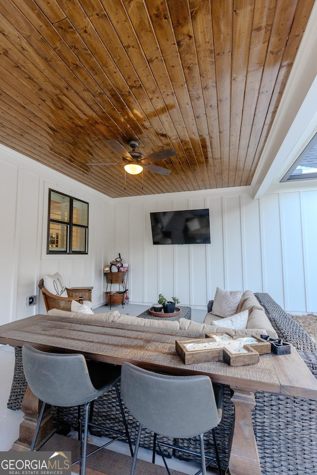 living room featuring wooden ceiling