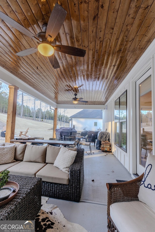 view of patio / terrace featuring an outdoor living space, a grill, and ceiling fan