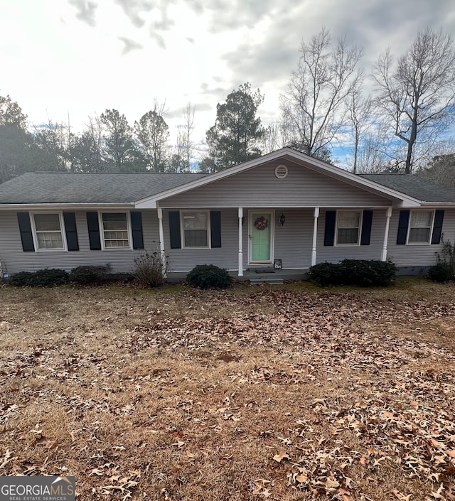 ranch-style house featuring covered porch