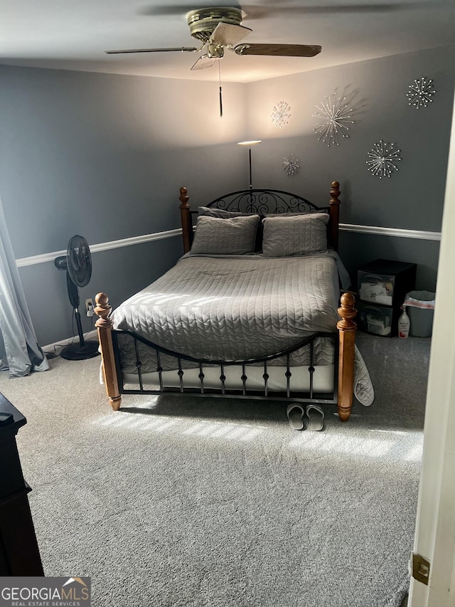 bedroom with carpet floors and ceiling fan