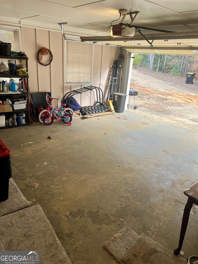 garage featuring a garage door opener