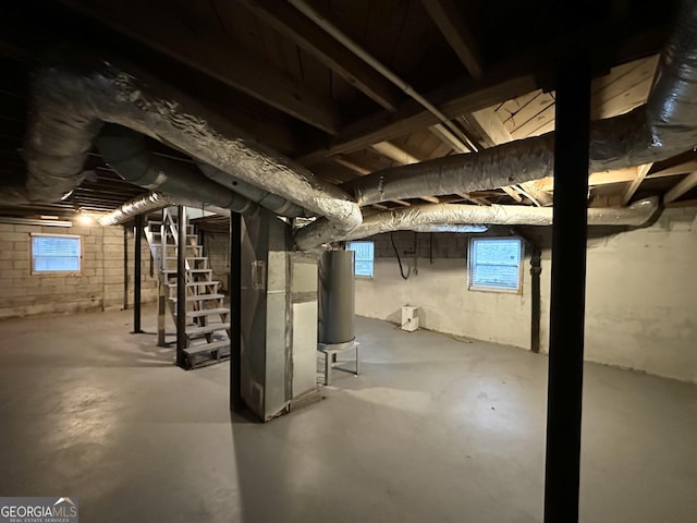 basement with heating unit and water heater