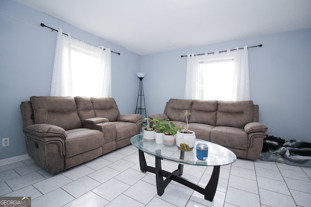 living room featuring light tile patterned flooring