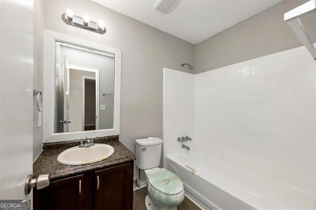 full bathroom with vanity, toilet, and tub / shower combination