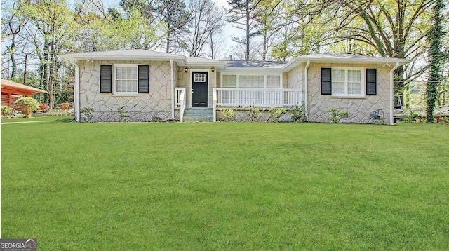 view of front of home featuring a porch and a front yard