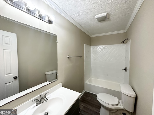 full bathroom with hardwood / wood-style floors, vanity, toilet, crown molding, and a textured ceiling