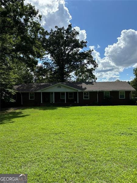 exterior space with a front yard