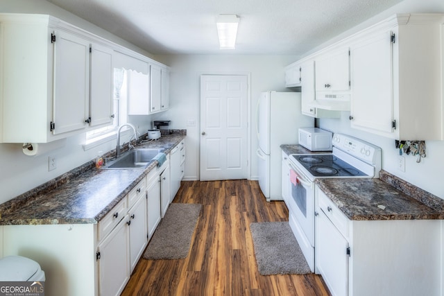 kitchen with white cabinetry, sink, white appliances, dark wood-type flooring, and a textured ceiling