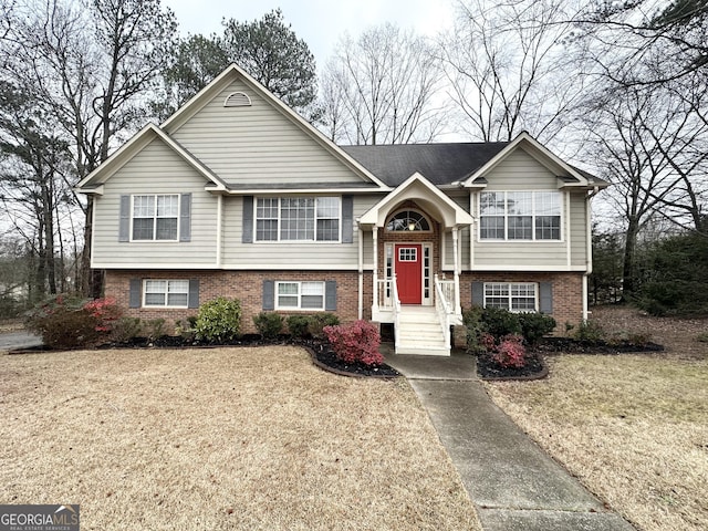 bi-level home with a front yard