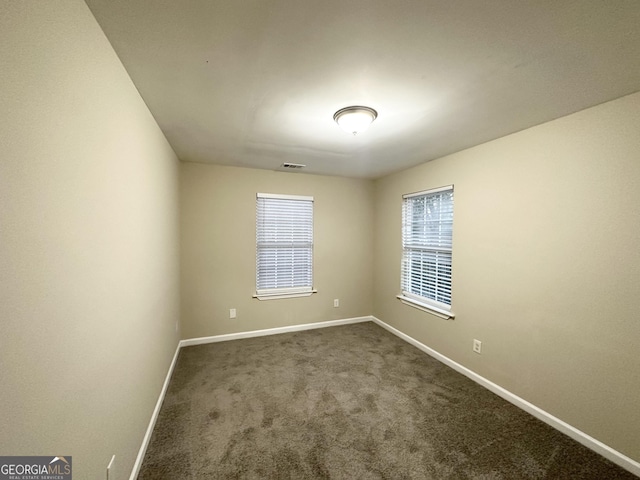 empty room with carpet floors