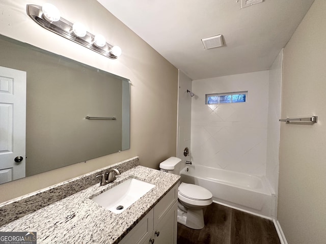 full bathroom featuring bathtub / shower combination, vanity, toilet, and wood-type flooring