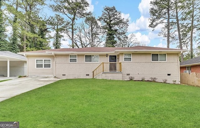 ranch-style house featuring a front lawn