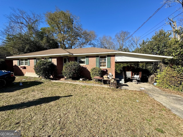 ranch-style house with a carport and a front yard