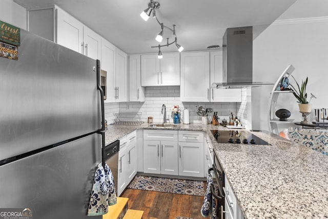 kitchen featuring white cabinetry, light stone counters, black appliances, and island exhaust hood