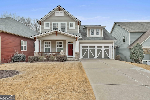 view of front of house with covered porch and a front lawn