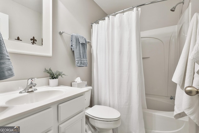 full bathroom with shower / tub combo with curtain, vanity, and toilet