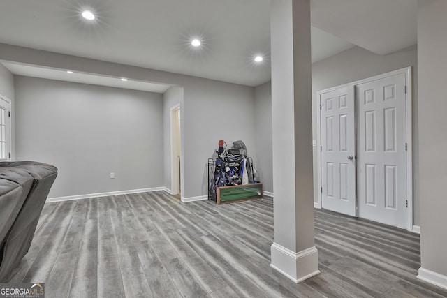 basement featuring light hardwood / wood-style floors