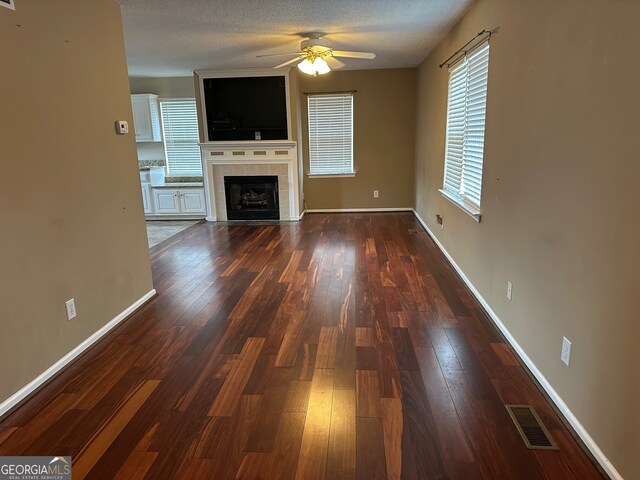 kitchen featuring sink, white cabinetry, appliances with stainless steel finishes, ceiling fan, and hardwood / wood-style floors