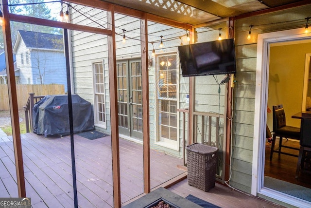 sunroom / solarium featuring plenty of natural light