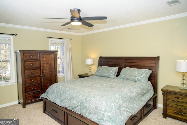 bedroom with crown molding, ceiling fan, and light carpet