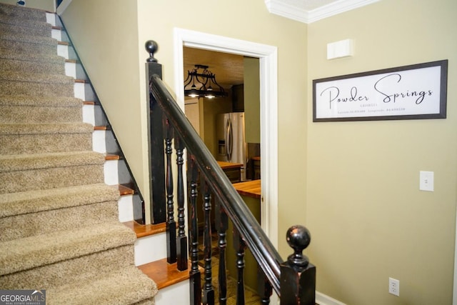 stairs featuring ornamental molding