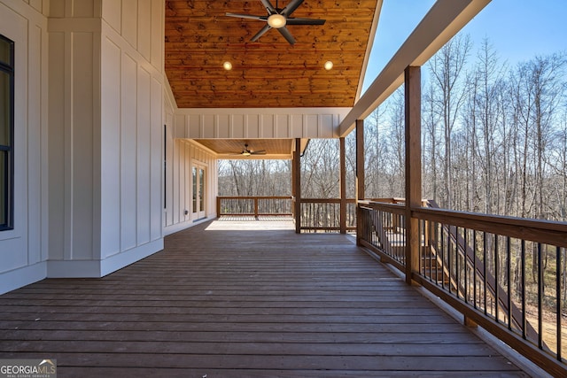 wooden deck with ceiling fan