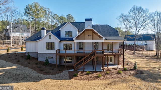 rear view of house featuring a deck and a patio