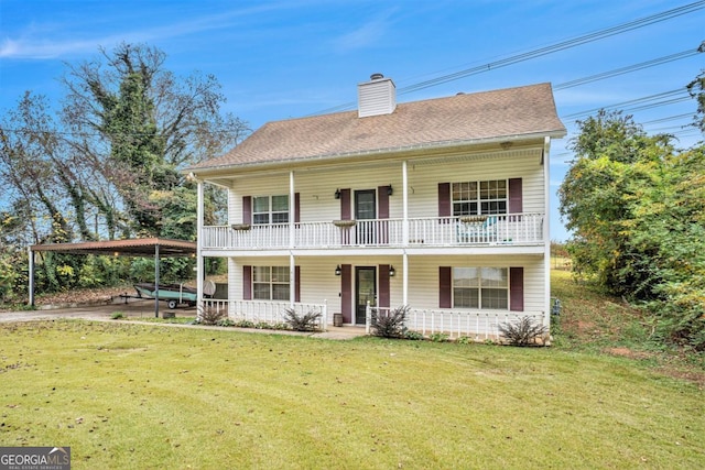 view of front of home featuring a front yard and covered porch