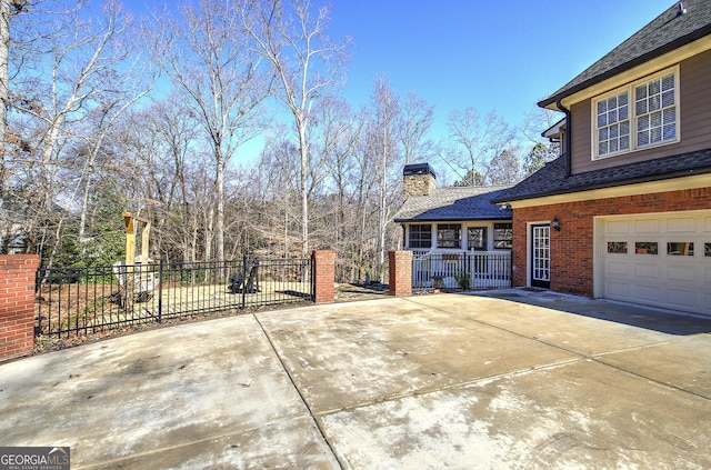 view of property exterior with a garage