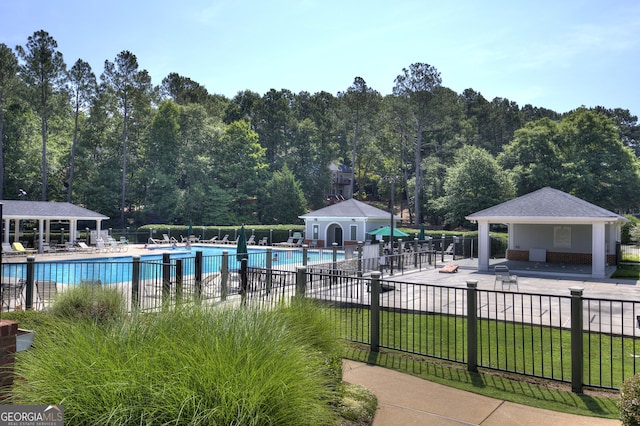 view of swimming pool featuring a gazebo and a patio area