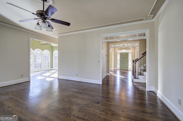 unfurnished room featuring crown molding, dark hardwood / wood-style floors, and ceiling fan