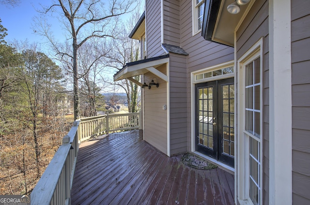 wooden terrace featuring french doors