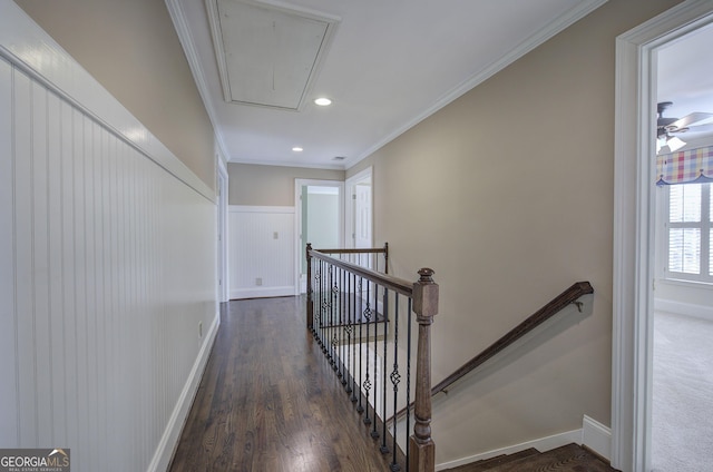 corridor featuring dark hardwood / wood-style flooring and ornamental molding