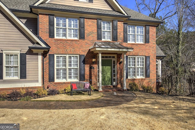 view of front facade featuring a front yard